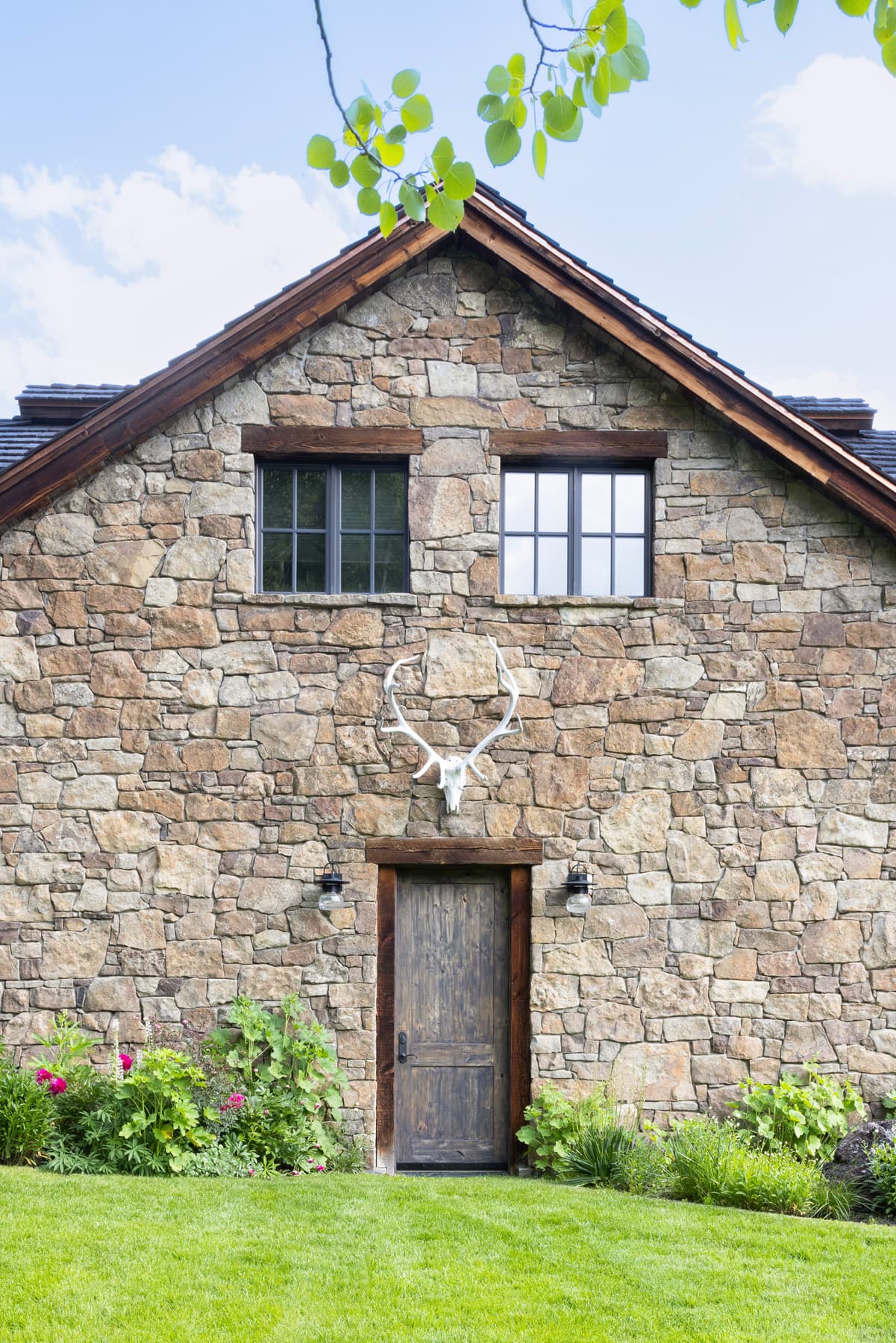 Beautiful Stonework and rustic details make the Light and Bright Interior Design Project by Nida Risto Interiors in Jackson Wyoming spectacular interior design. 